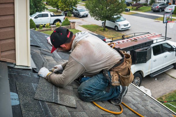 Professional Roofing technician working in Simms, TX